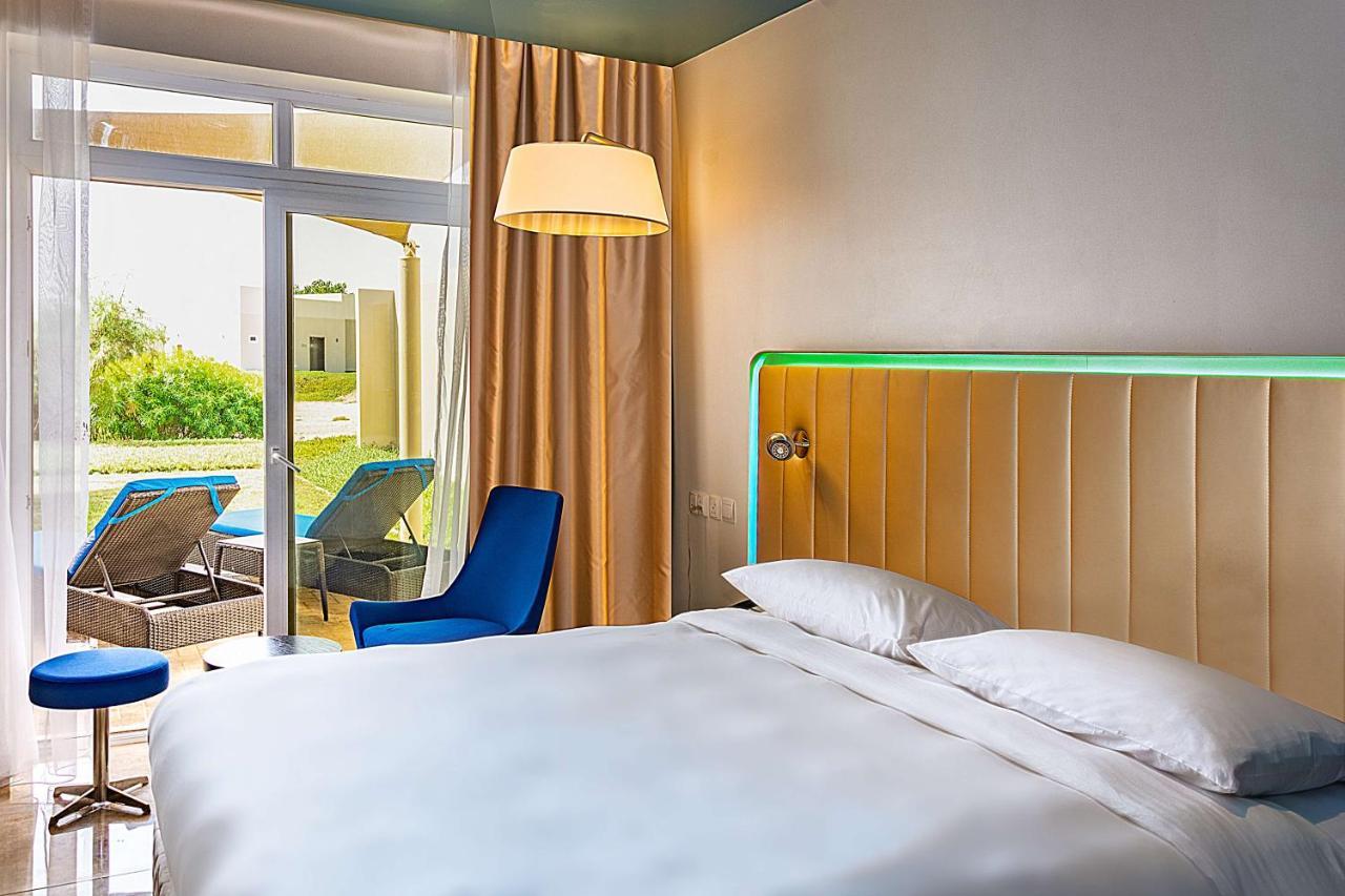 Park Inn By Radisson Hotel And Residence Дукм Экстерьер фото